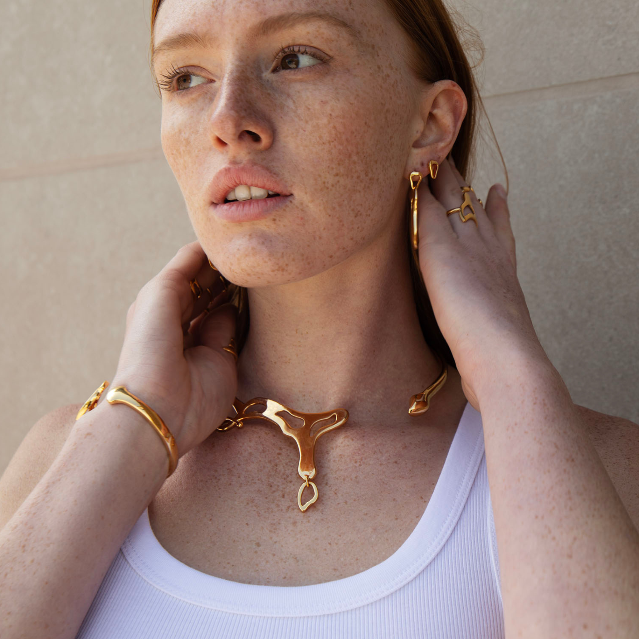 Nova Studs-Mini In 18k Solid Gold lifestyle view | Za Zewelz affordable luxury 18k gold plated earrings