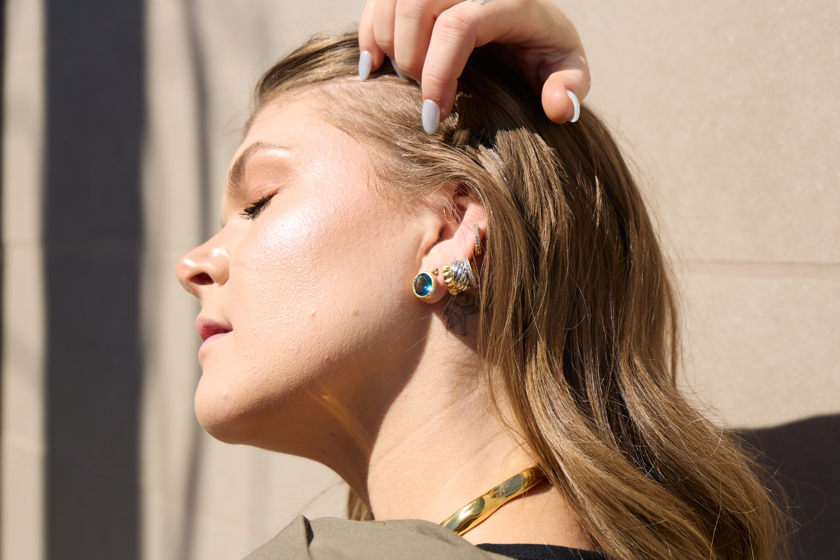 Iconica Studs In 18k Solid Gold lifestyle view - Za Zewelz Iconica Collection 18k gold plated earrings
